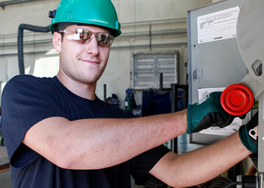 Male electrician working outside