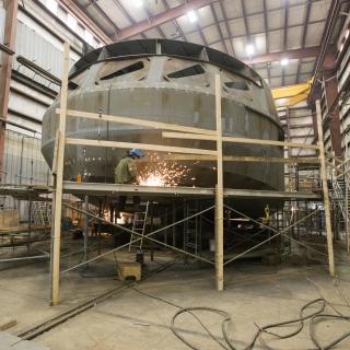 Boat builder working